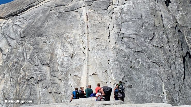 Hikers Considering The Half Dome Cables 2