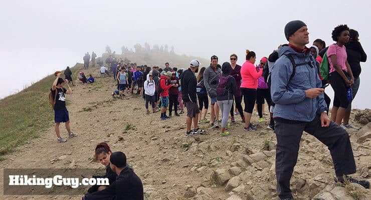 hikers on line at summit